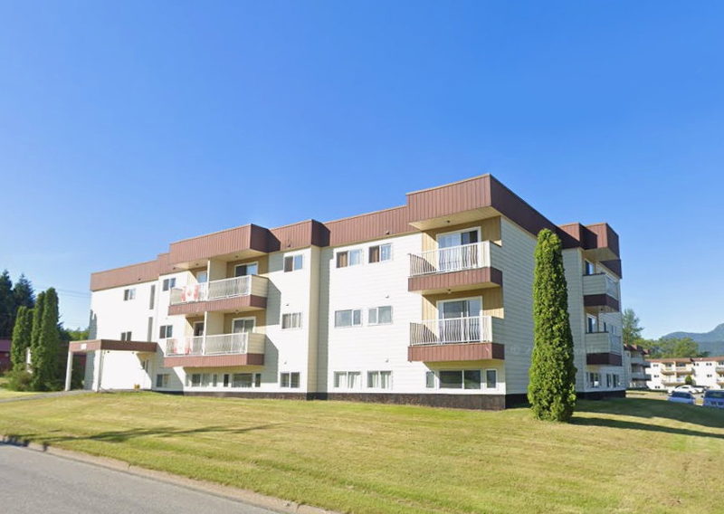 380 Quatsino Boulevard apartment building and lawn
